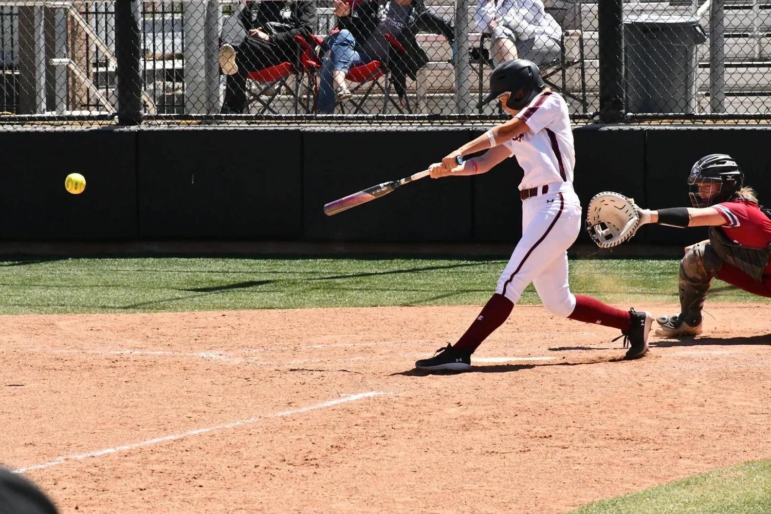 Aislyn Sharp at bat during a softball game